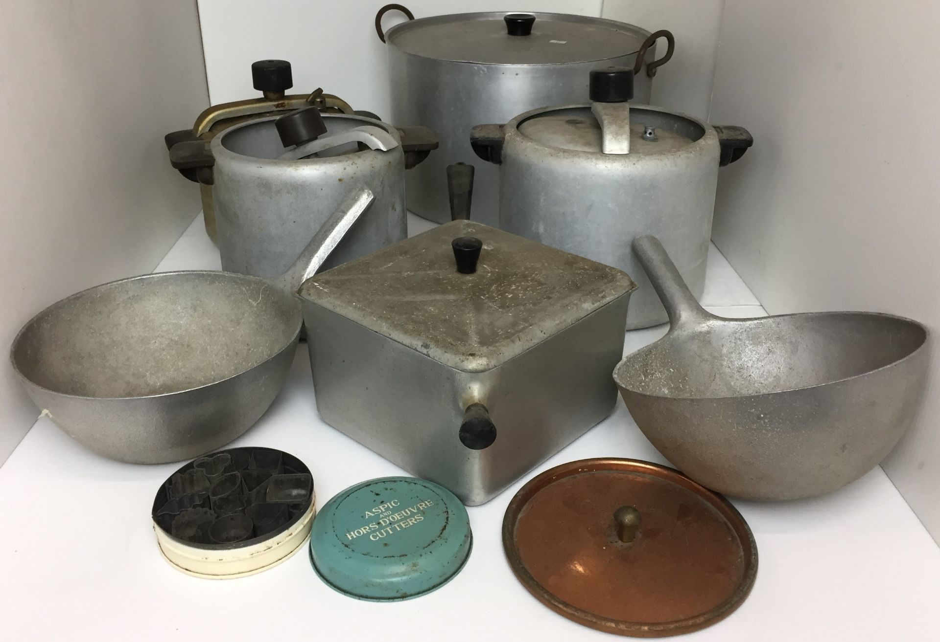 Nine items including aluminium and other metal pans, including large two handled pan 36cm diameter,