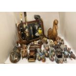 Contents to part of rack - assorted wood and other duck ornaments, a large wood duck,