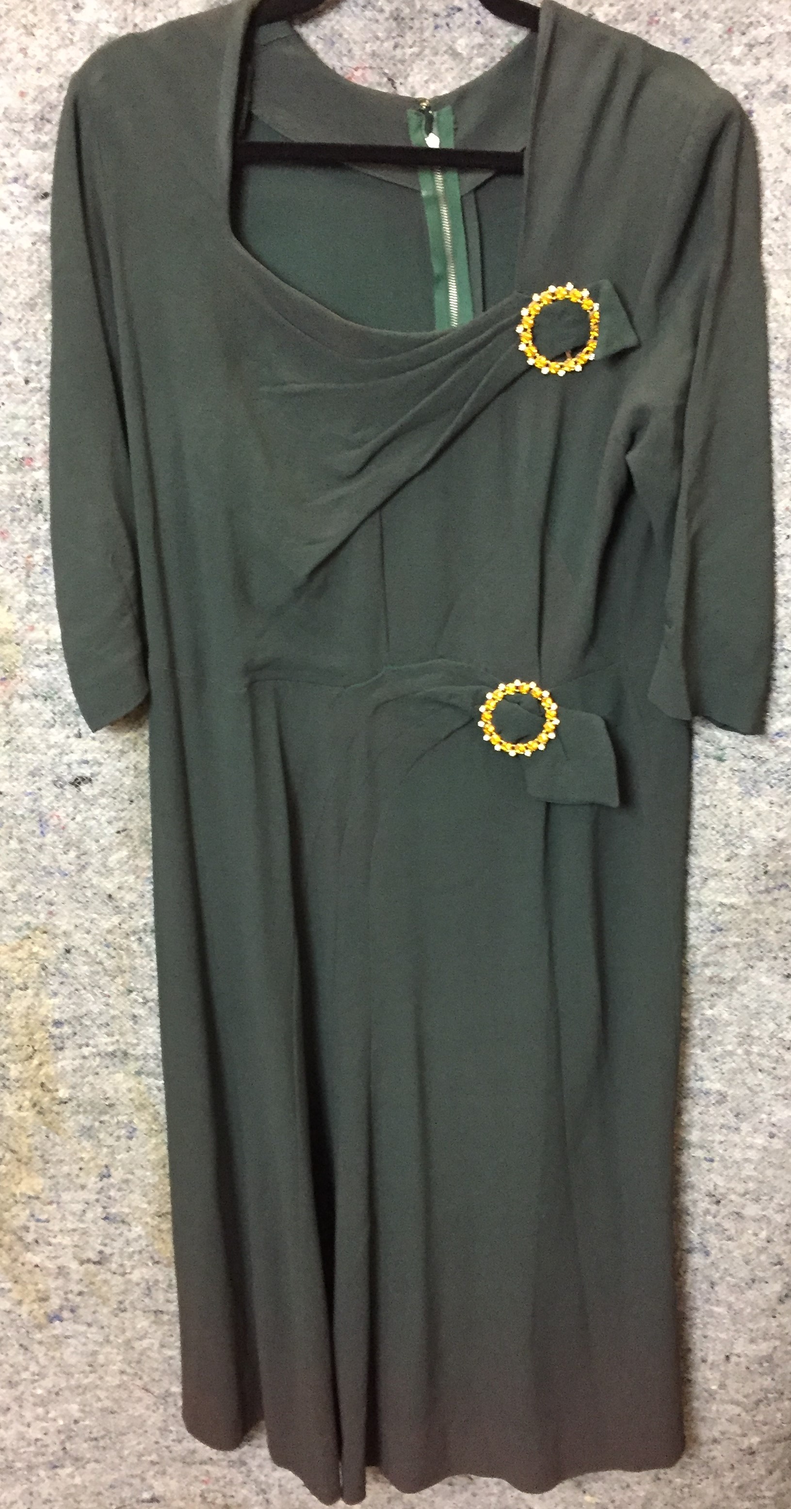 Ladies green dress (Saleroom location: on rail at S13)