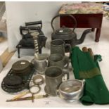 Contents to part of rack, pewter tankards, old black metal kettle, old chisels,