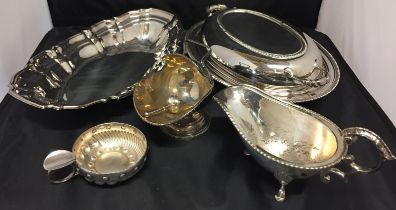 Six pieces of silver plate including covered oval dish 20 x 21cm, oval footed scalloped dish,