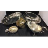 Six pieces of silver plate including covered oval dish 20 x 21cm, oval footed scalloped dish,