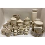 Forty-four pieces of Harvest pattern no 1418 oven to tableware including jars, gravy boat,