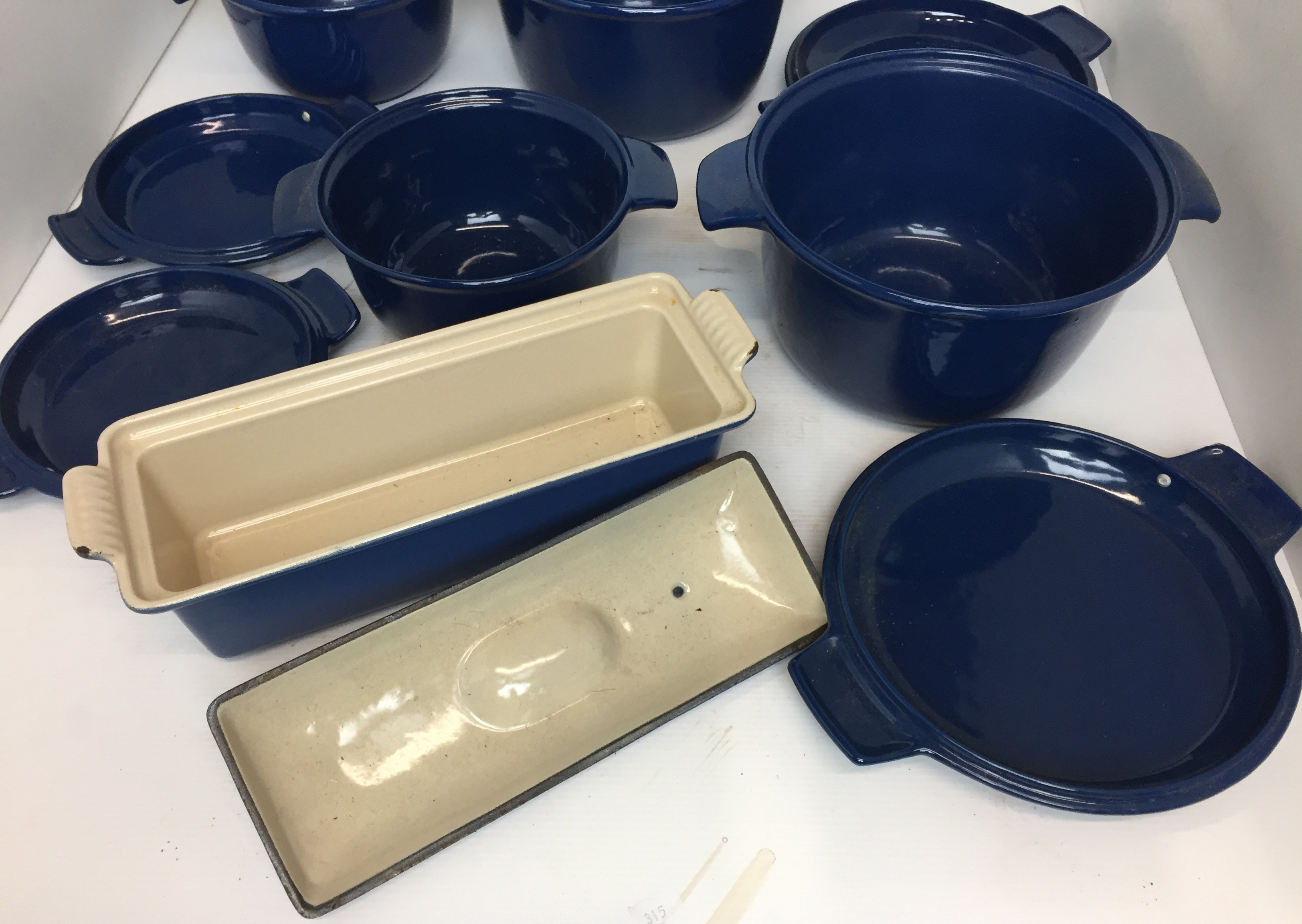 Five pieces of blue enamel cast iron oven to table ware including four casseroles by Nacco of - Image 3 of 3
