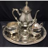 Four pieces silver plate - three piece Grenadier A1 tea/coffee service with unmarked tray