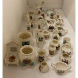 Contents to part of rack - thirty-four pieces of crested china by Victoria, Arcadian, W H Goss, etc.