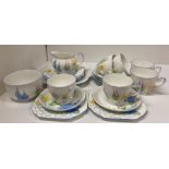 Twenty-one pieces of Grafton china floral patterned tea service (one plate repaired) (Saleroom