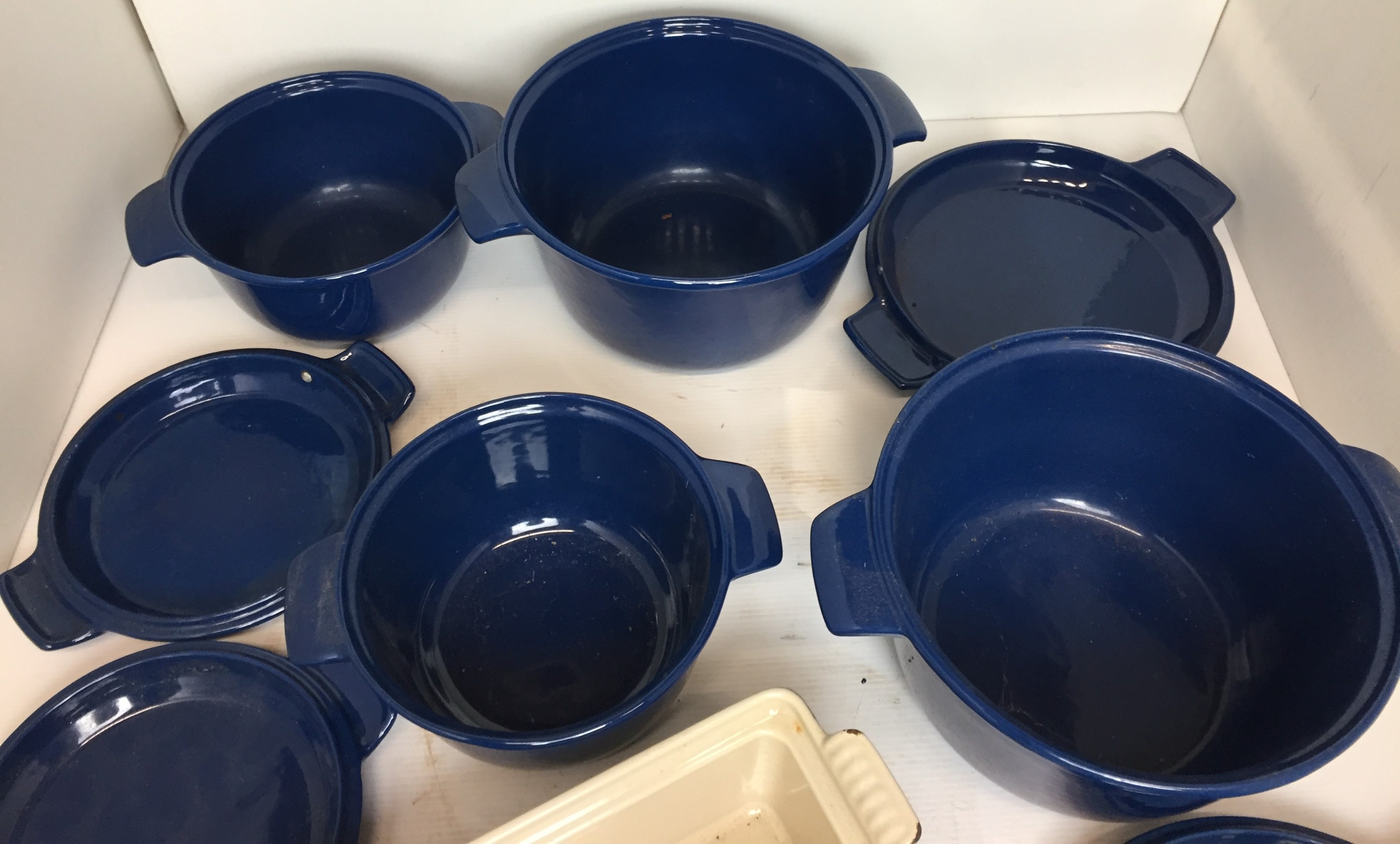 Five pieces of blue enamel cast iron oven to table ware including four casseroles by Nacco of - Image 2 of 3
