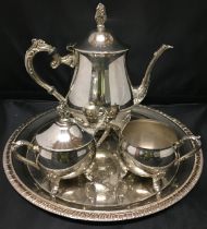 Four pieces silver plate three piece tea/coffee service and tray (Saleroom location: T11)