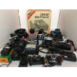 Twenty photographic items including thirteen cameras by Pentax, Olympus, Beirette, Zenit etc,