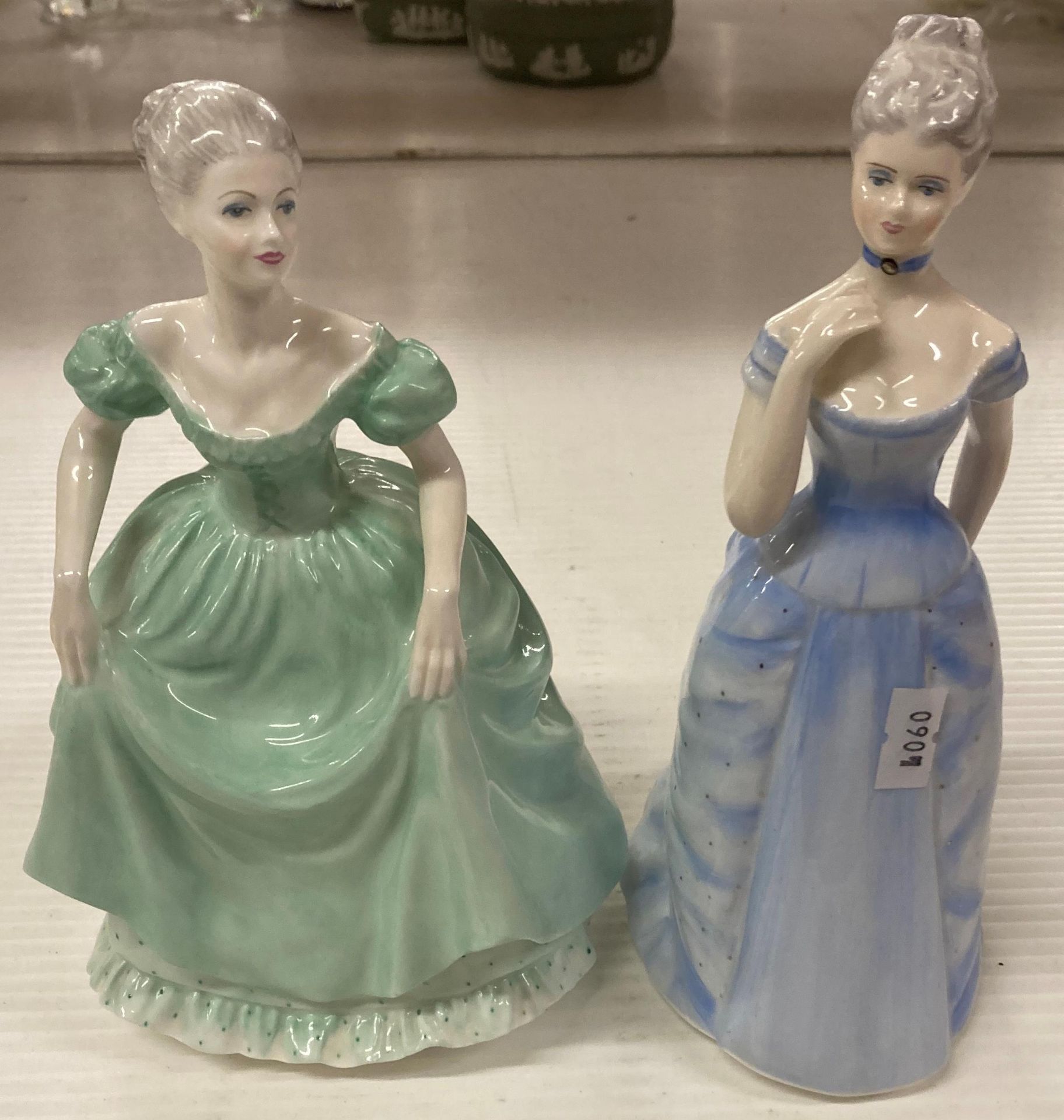 Two Coalport Bone China Ladies of Fashion figurines 'Henrietta' 20cm and 'Emma' 21cm (saleroom