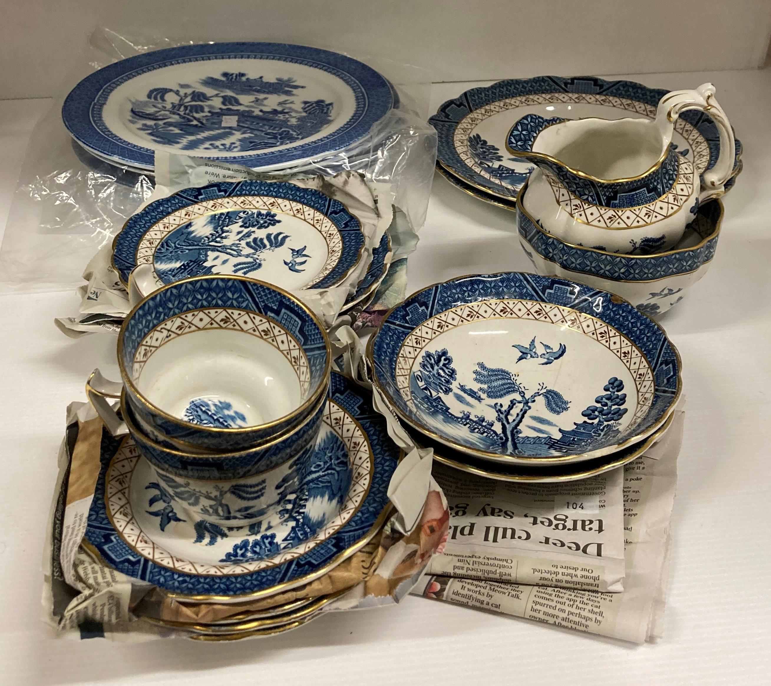 Four Cauldron blue willow patterned plates and seventeen pieces of Booth Real Old Willow pattern no