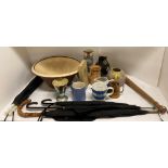 Remaining contents to rack - pancheon (with cracks), wood truncheon, parasols, Tala measuring jug,