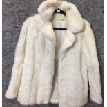 White faux fur jacket size 12 (Saleroom location: on rail at S13)