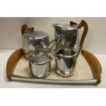 A Picquot ware five piece tea/coffee set including tray (Saleroom location: Z06)
