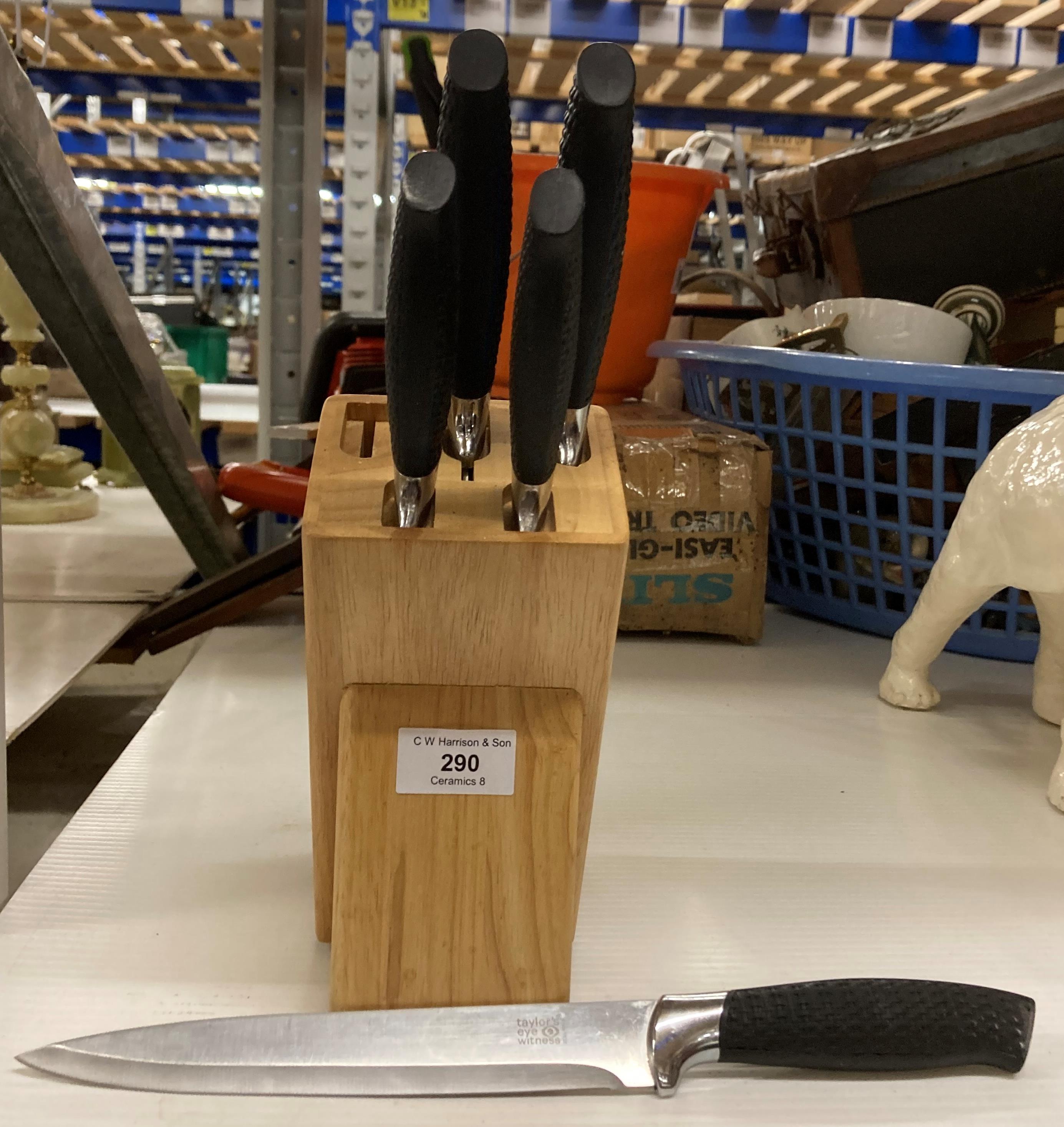 A wood knife block with five Taylor's Eye Witness kitchen knives (saleroom location: X13)