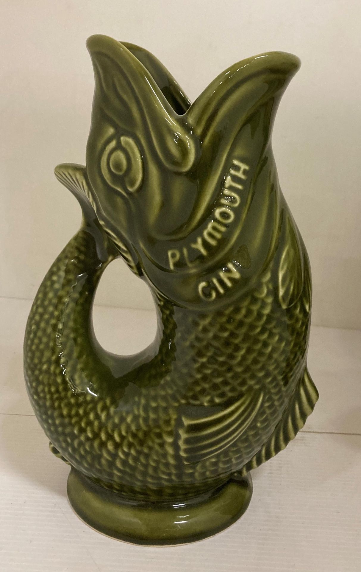 A Dartmouth Devon Plymouth Gin green glazed fish jug, frog and parrot jugs, etc. - Image 4 of 4