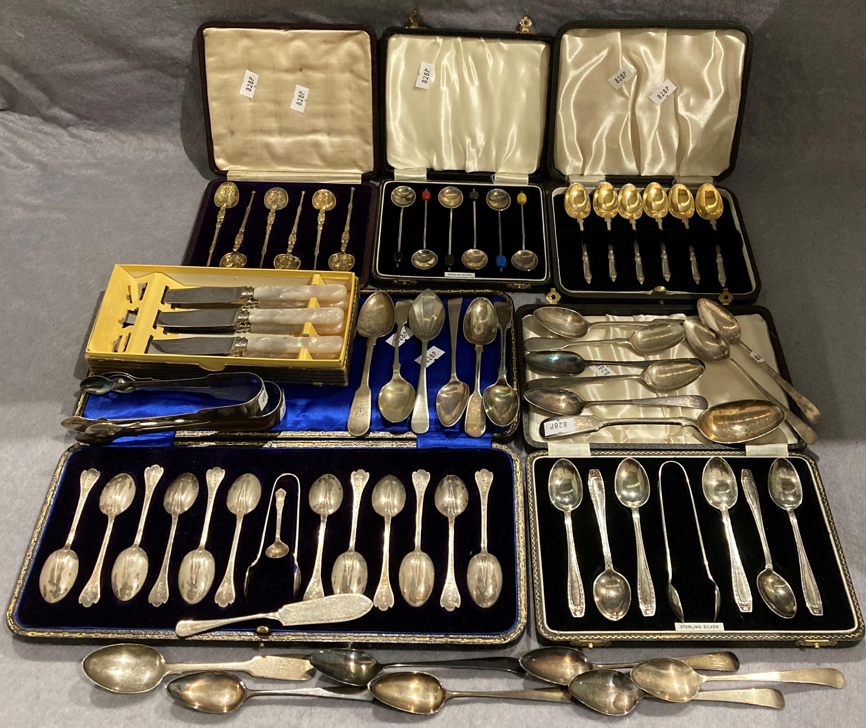 Three boxed sets of silver spoons/teaspoons,