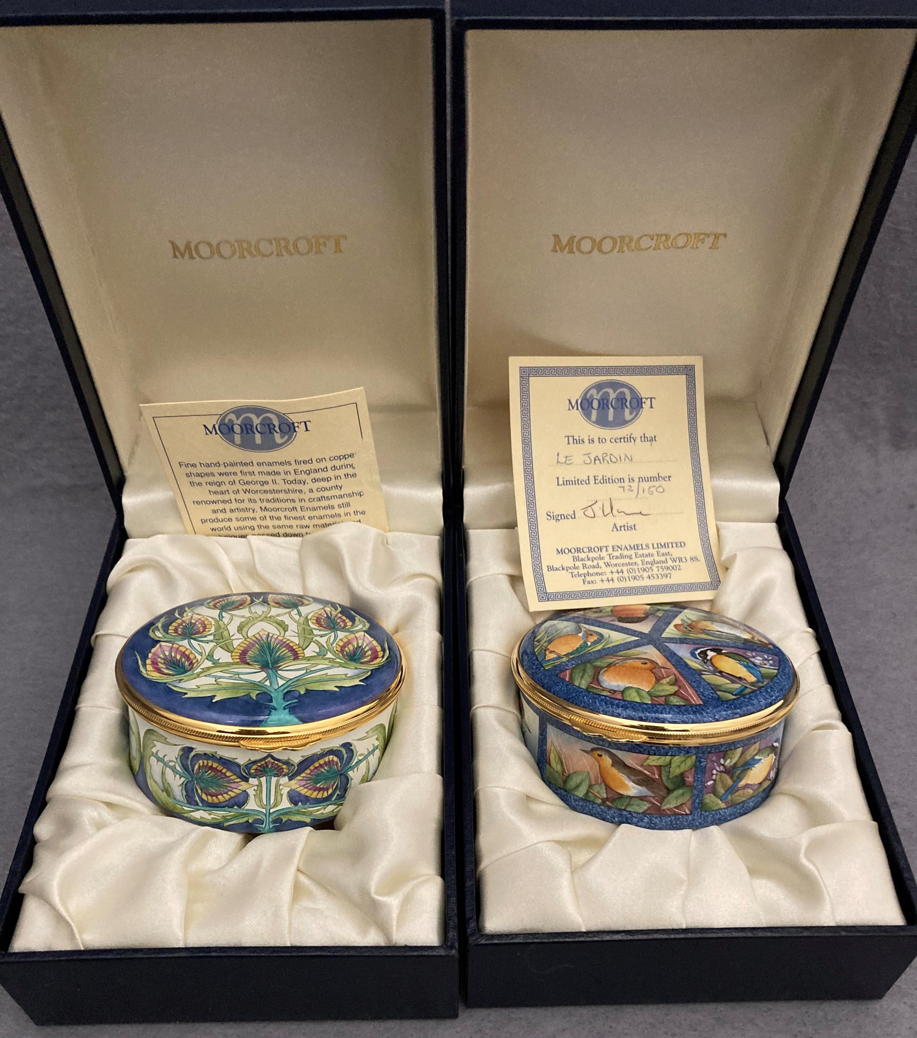 Two boxed Moorcroft round enamel trinket boxes including limited edition no 75/150 and one other