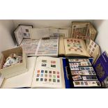 Contents to box - four larger stamp albums featuring World and GB stamps,