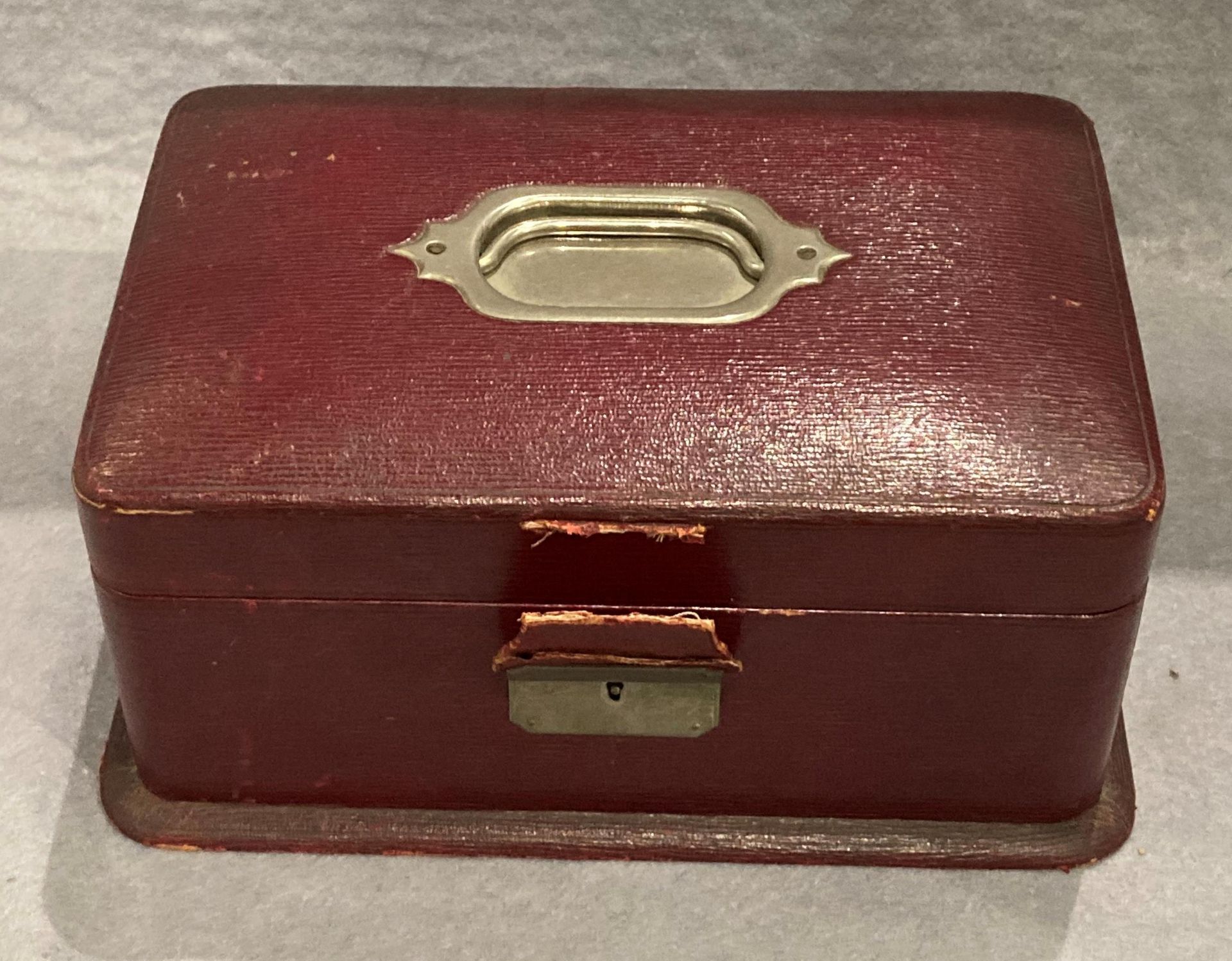 A red leather sewing box - red velvet and silk lining with tools to lid and needle case 9½" x 6½" x - Image 2 of 2