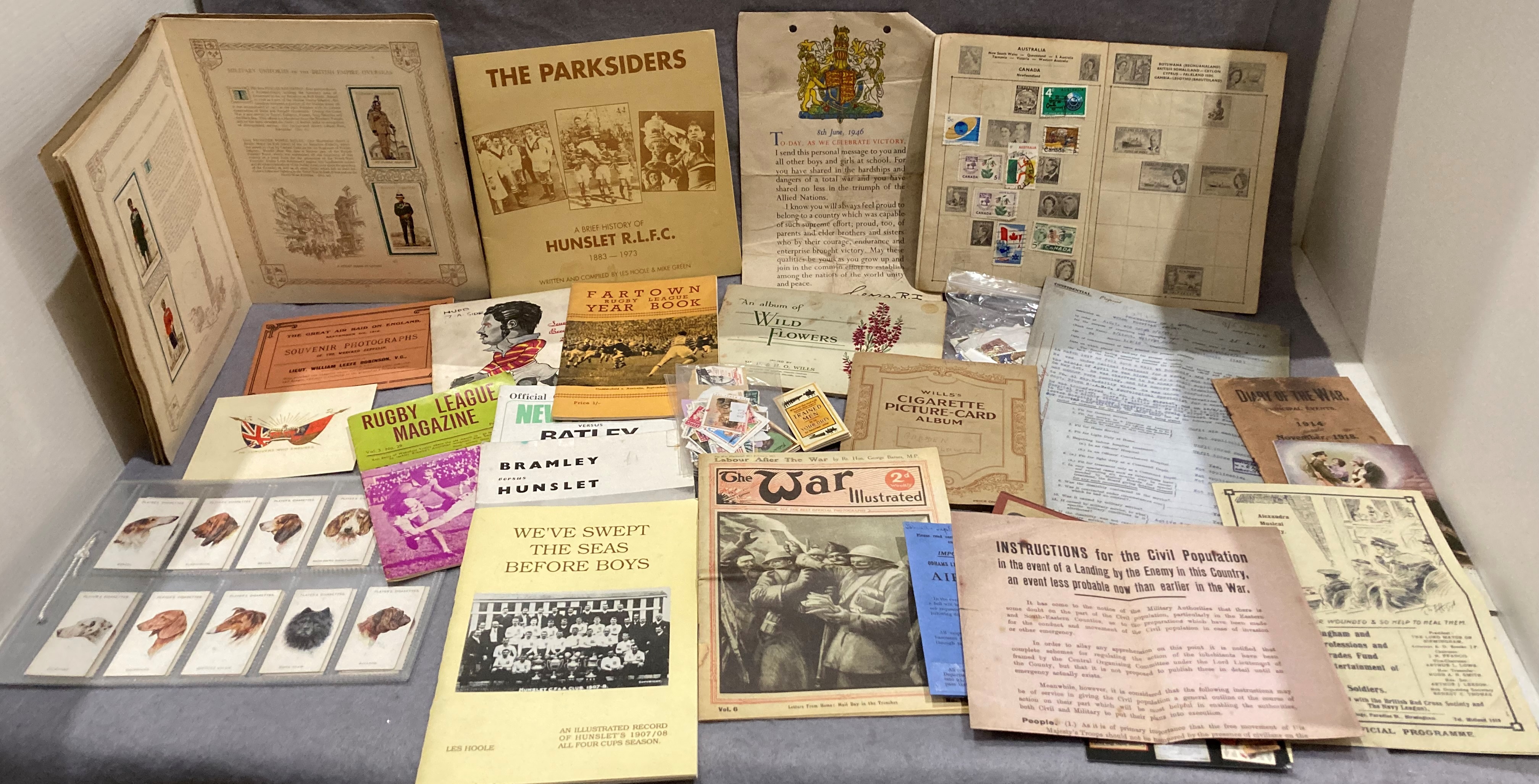 Contents to tray - a collection of interesting ephemera including small Thunderjet stamp album and