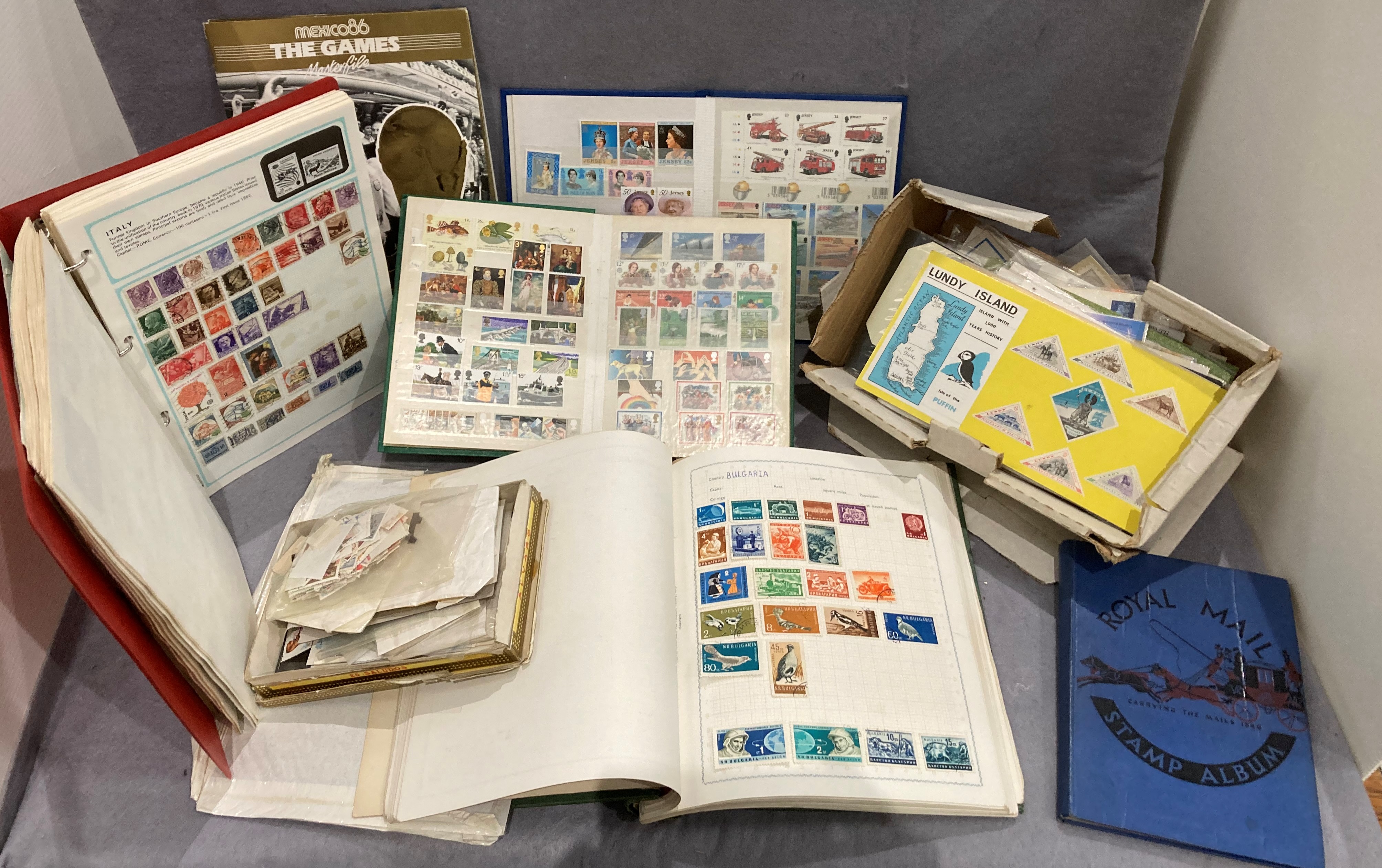 Four various stamp albums containing World and GB stamps,