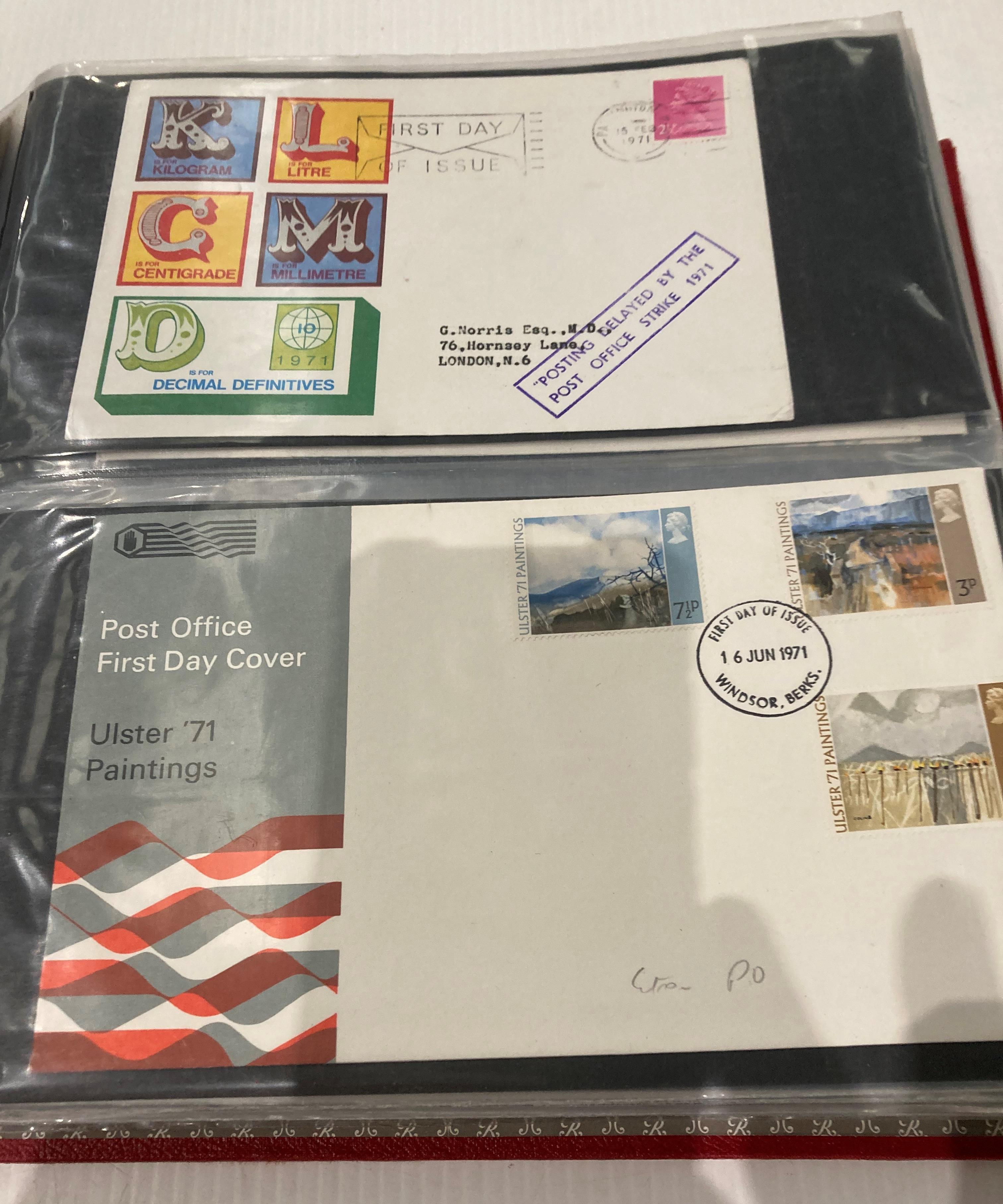A red lever arch album containing mainly 165 Post Office First Day covers and franked envelopes - Image 4 of 9