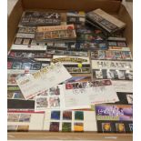 Contents to tray - 85 individual packs of mainly Royal Mint stamps circa 1990's to mid 2000's