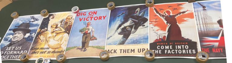 A set of seven reproduction Second World War morale boosting posters each 76cm x 51cm reproduced