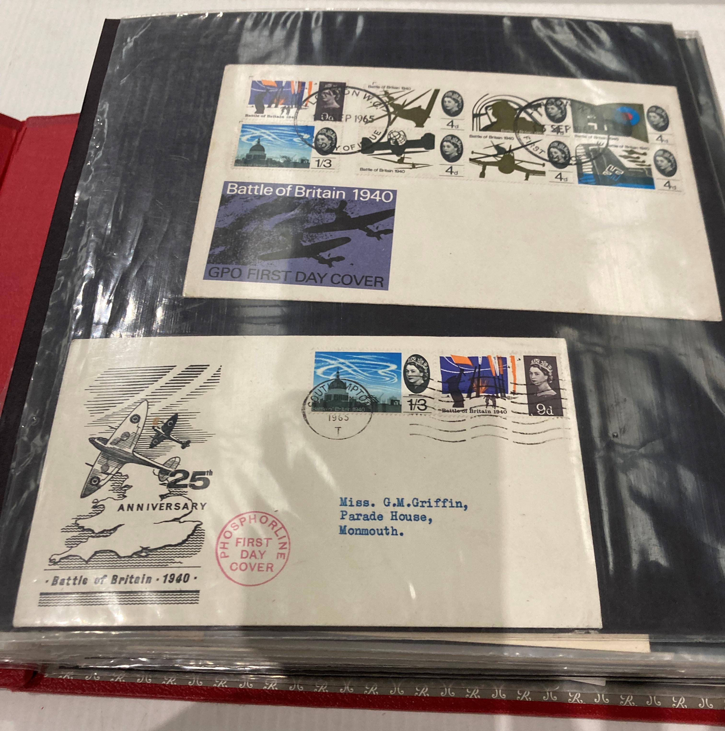 A red lever arch album containing mainly 165 Post Office First Day covers and franked envelopes