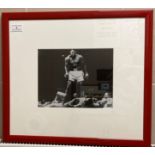A signed black and white photograph of Muhammad Ali 23cm x 20cm in red frame complete with