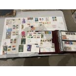 Two albums and a wallet containing 94 Post Office and Royal Mail First Day Covers ranging from the