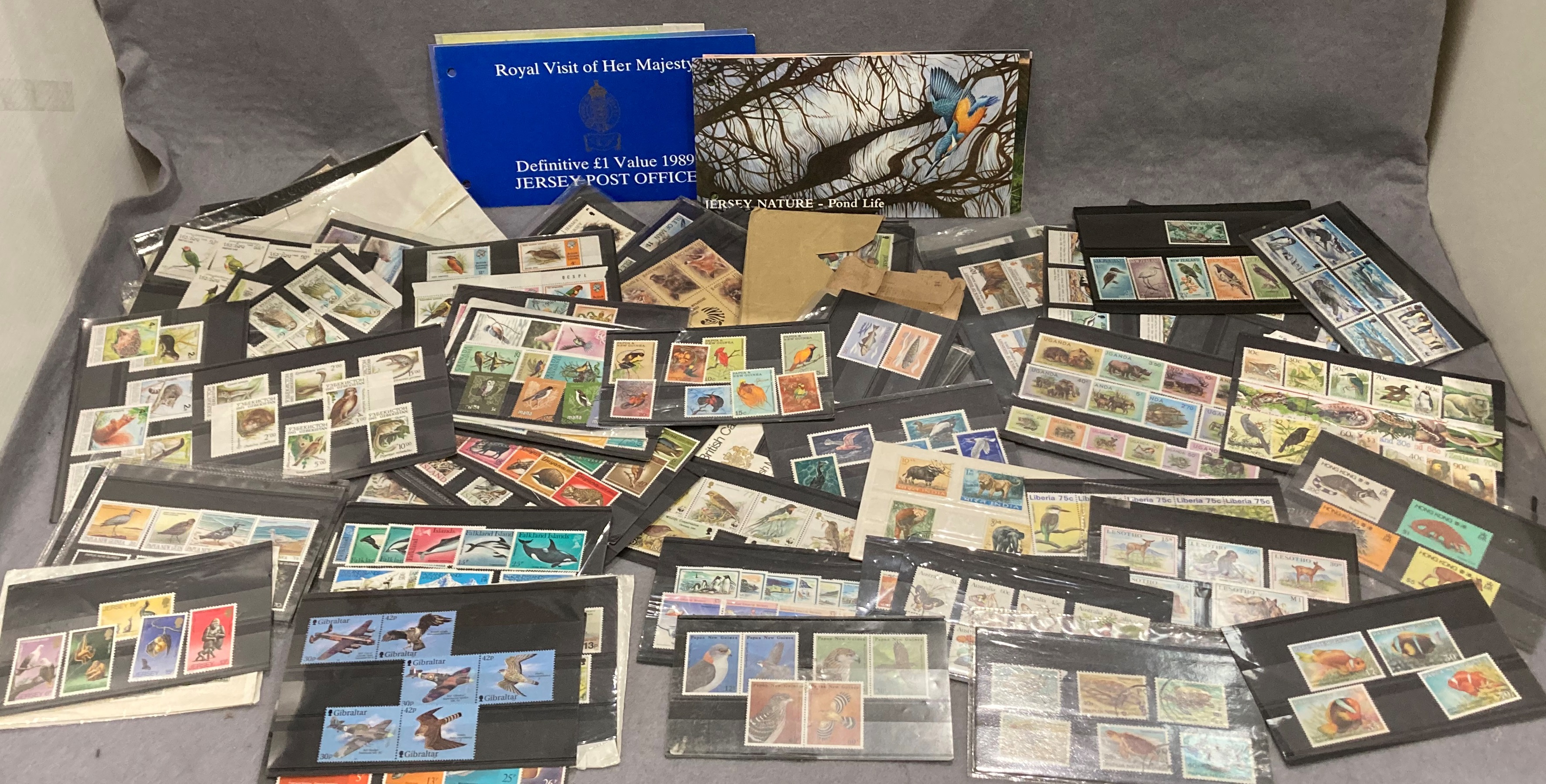 Contents to box - Jersey Post Office issued stamps - 'Birds of Prey', 'Royal Visit of her Majesty',