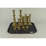 Three pairs of Victorian brass candlesticks,
