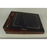 A large 19th Century brass bound walnut writing box with interior,