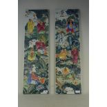 A pair of 20th Century porcelain panels depicting the five immortals,