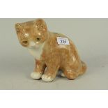 A Winstanley pottery cat, modelled as a ginger tom with glass eyes and signed to the base,