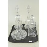 A pair of late Victorian cut glass decanters,