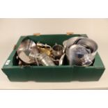 A box of mixed metal wares including a champagne ice bucket, plated candelabra,