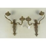 A pair of late 19th Century French bronze wall lights