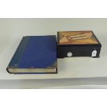 A wooden inlaid top humidor plus a large antique 'bought transfer' ledger book