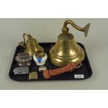 Two brass bells plus five assorted lighters