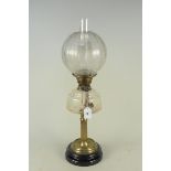 A Victorian oil lamp with brass column clear glass reserve and etched glass shade,