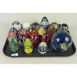 A collection of twenty paperweights