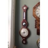 A late 19th Century mahogany, onion top, five dial mercury barometer, unsigned,