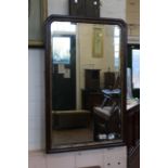 An 18th Century mahogany wall mirror with bevel plate,