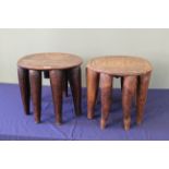 Two Nigerian Nupe carved wooden stools,