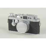 A circa 1960 Leica IIIg Rangefinder camera, NR943942, fitted with a Leitz Elmar f/2.