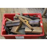 A box of vintage wood working tools